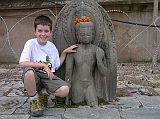 Kathmandu Pashupatinath 07 Peter Ryan With 7C Half-Buried Buddha Statue